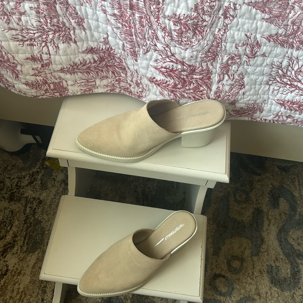 Like new comfy tan suede mules by Internationally.  Size 7.